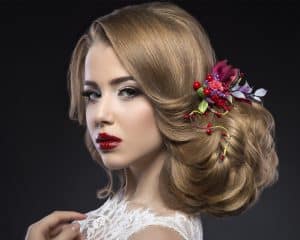 A young women with bridal hair, one of the services that The Mane House at Bloomsburys, Biddenden in Kent offer.